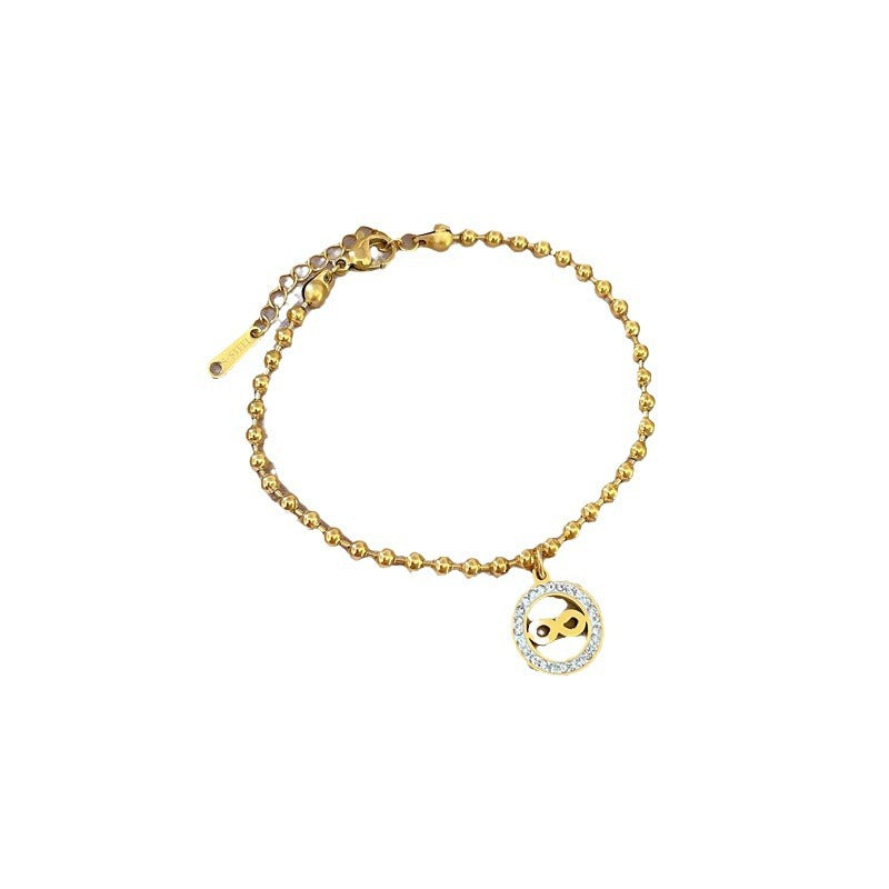 Bracciale da donna in stile vintage con cerchio di perline, realizzato in acciaio al titanio con placcatura in oro e texture ondulata