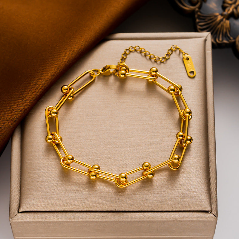 Bracciale a U Minimalista in Acciaio al Titanio con Finitura Placcata da Donna, Accessorio di Moda Ipoallergenico