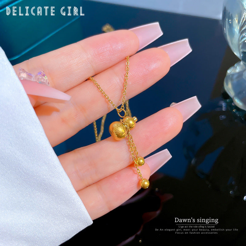 Collana girocollo con ciondolo a zucca geometrica da donna in acciaio al titanio con strass intarsiati, fresca e dolce