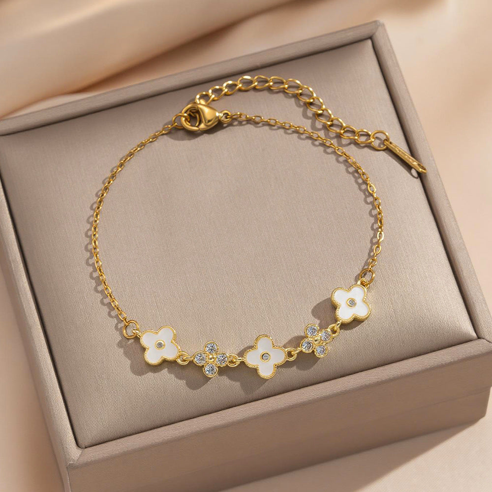 Bracciale da donna in acciaio al titanio placcato oro con zirconi intarsiati, motivo floreale e geometrico, stile pendolare, moda lusso leggero