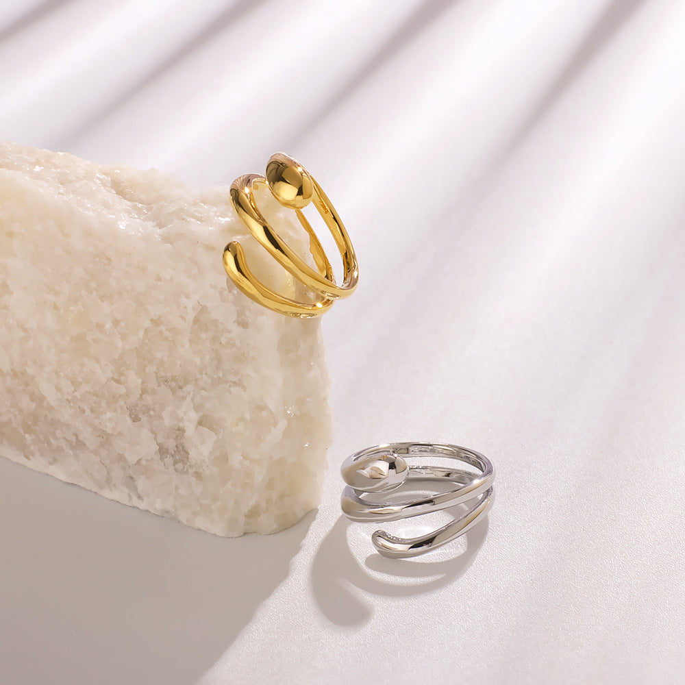 Anello multistrato minimalista in acciaio inossidabile lucidato da donna con forme geometriche e a goccia e placcatura sottovuoto in oro 18 carati