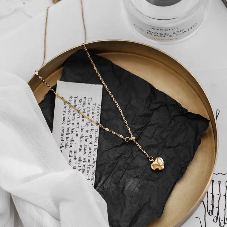 Minimalist Heart-Shaped Titanium Steel Pendant Necklace with Tassel and Adjustable Drawstring for Women