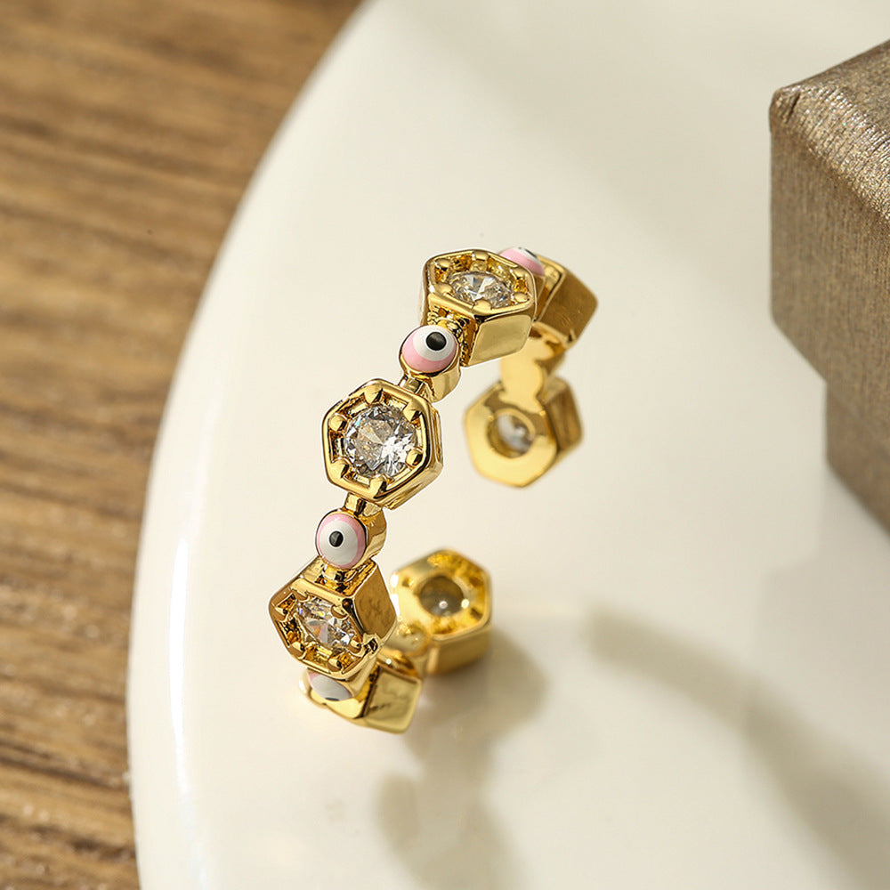 Anello da donna geometrico a forma di occhio, aperto, in rame placcato oro vero con intarsio in zirconi