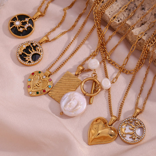 Collar con colgante de corazón, sol y estrella geométrica de moda vintage para mujer en acero de titanio con chapado en oro de 18 quilates