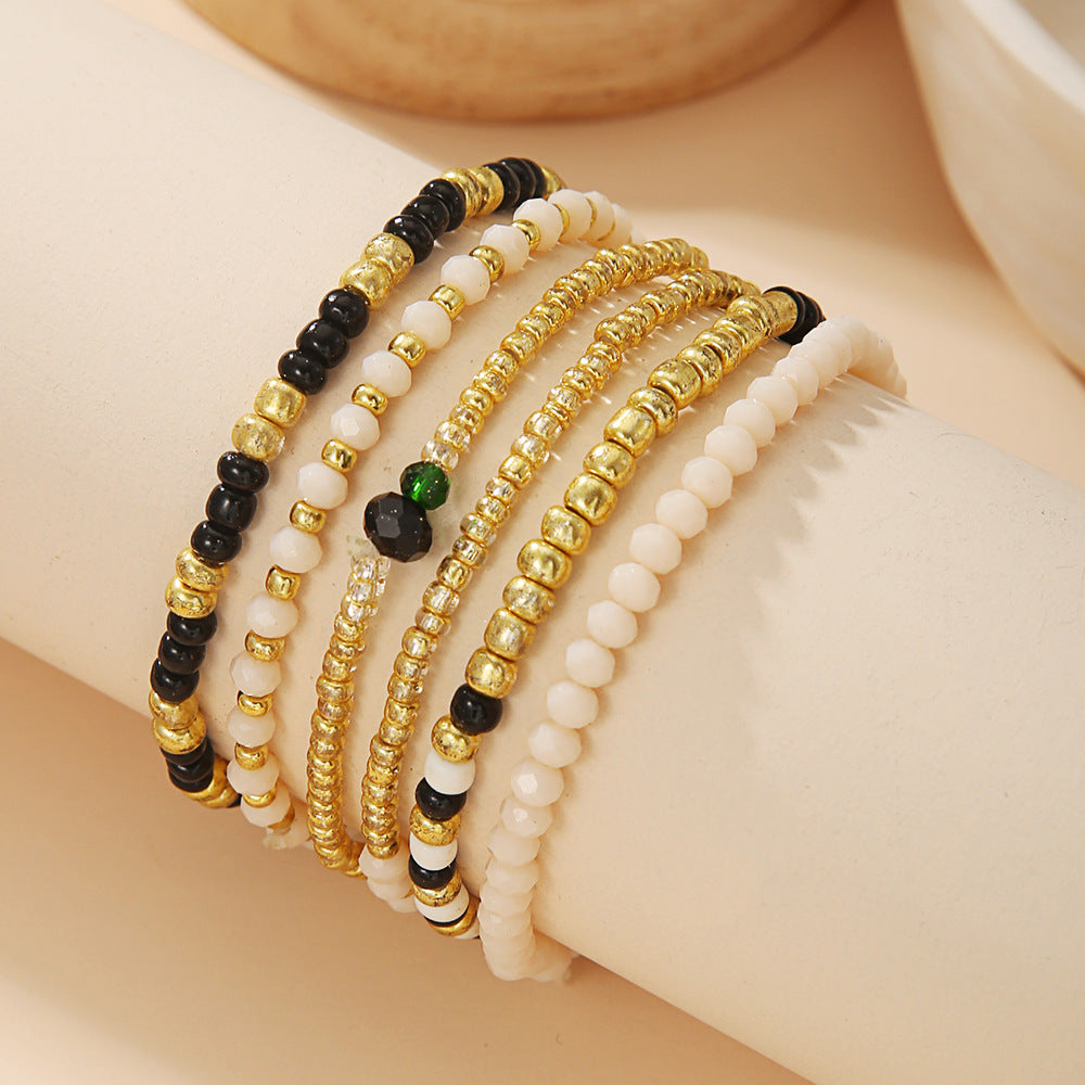 Bracciale elastico impilabile in stile bohémien per vacanze da donna con perline in vetro e design geometrico