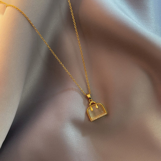 Elegante collana con ciondolo in pietra Occhio di Gatto da donna, catena a croce in acciaio al titanio, design geometrico, catena per clavicola con finitura placcata