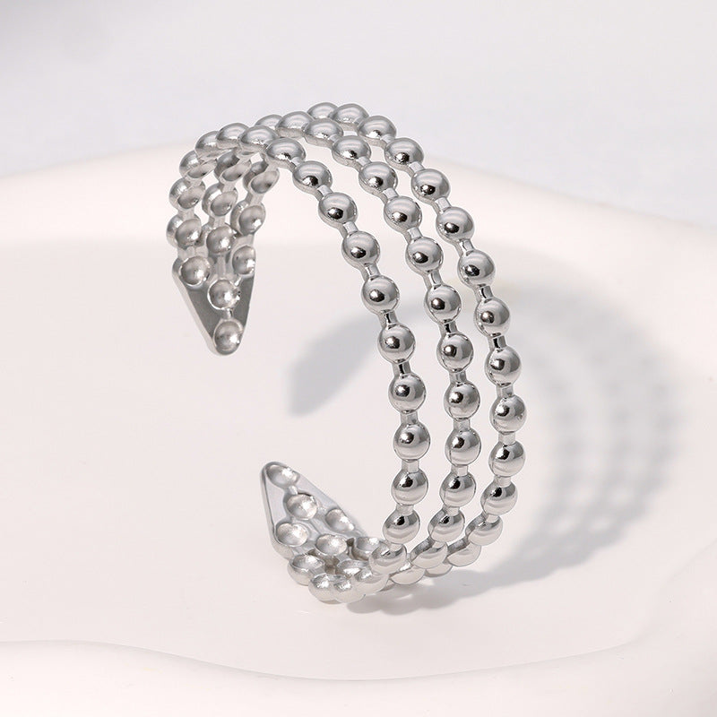 Bracciale da donna in acciaio inossidabile a linea geometrica minimalista con finitura placcata