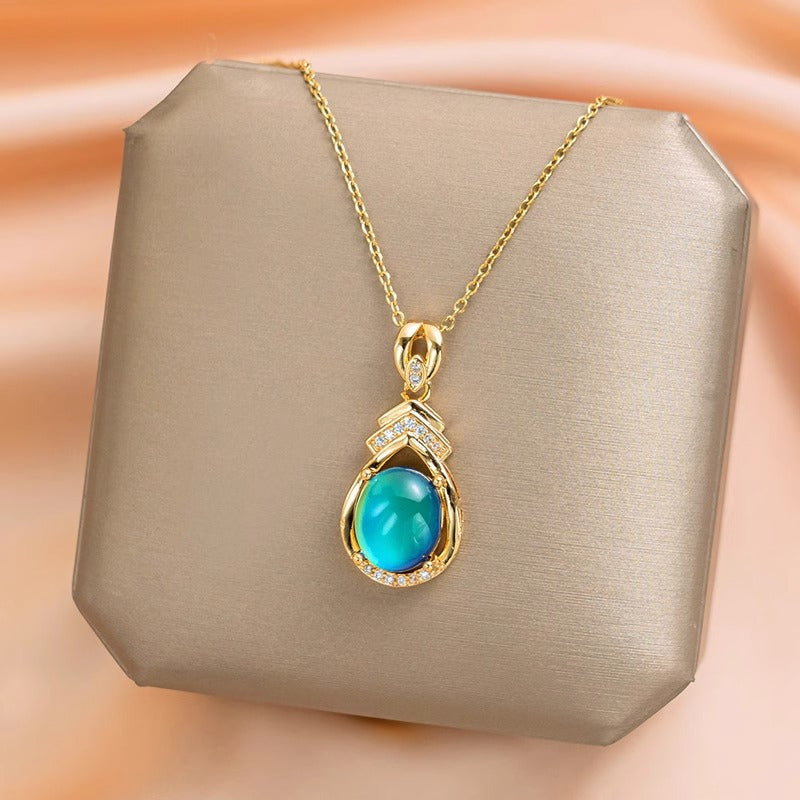 Collar termocrómico de gota de agua para mujer en acero de titanio con colgante chapado en oro, diseño floral y forma irregular en cadena tipo O