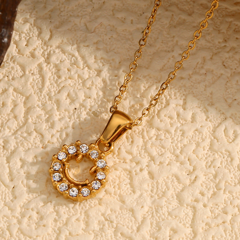 Minimalist Geometric Hollow Smiley Face Pendant Necklace for Women in Stainless Steel with 18K Gold Plating and Zircon Inlay