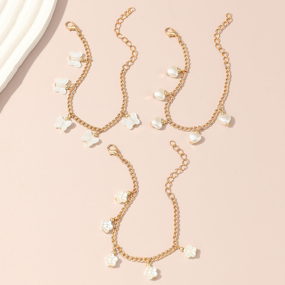 Conjunto de pulseras de metal con colgante de perlas, flores y mariposas en forma de corazón, hecho a mano, estilo princesa, para niñas