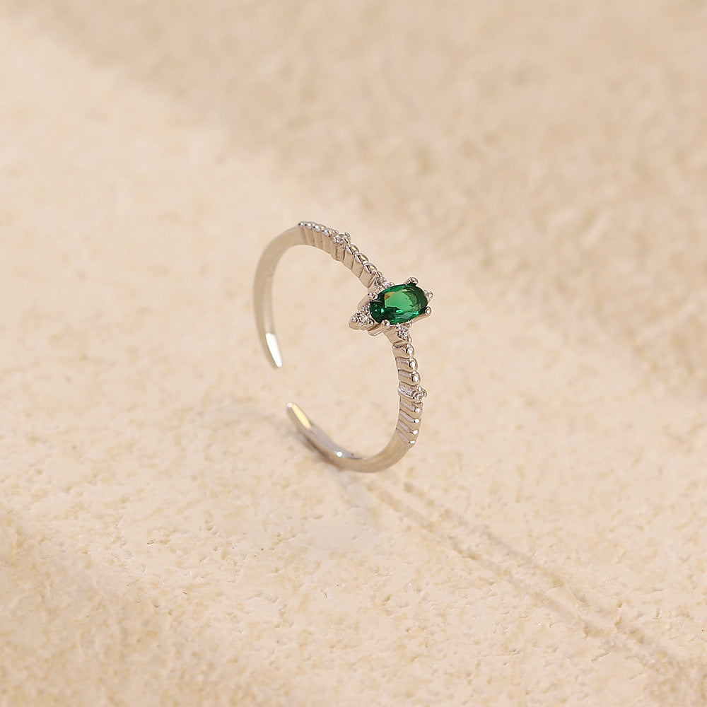 Anello di lusso elegante geometrico placcato in argento sterling 925 con zirconi cubici color smeraldo, rotondo, ovale, design aperto da donna