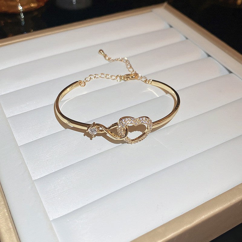 Pulsera tipo brazalete de aleación de cobre bañada en oro de lujo con incrustaciones de diamantes de imitación para mujer