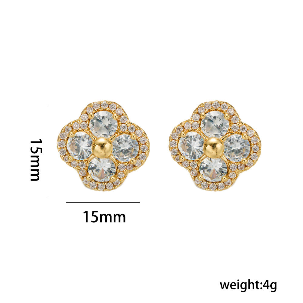 Orecchini a perno con fiore a quattro foglie in stile lussuoso in rame placcato oro con forma geometrica e zirconi brillanti