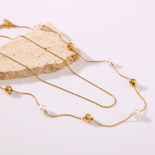 Collana a doppio strato minimalista con perle a sfera in acciaio al titanio placcato oro 18 carati da donna