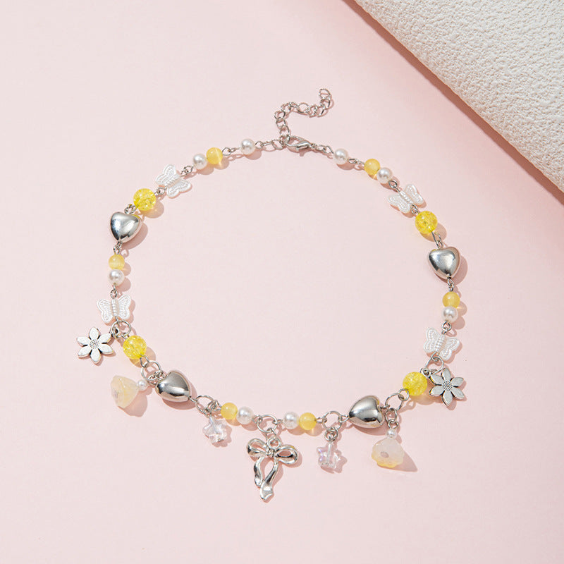 Collana con perline di vetro fatte a mano a forma di fiocco per bambine con ciondolo in lega, stile fresco e dolce