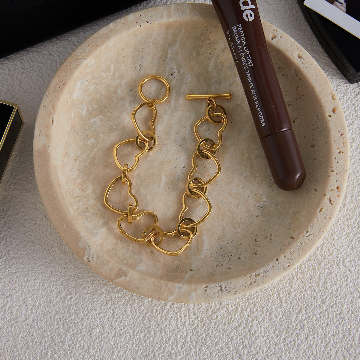 Elegante bracciale da donna in acciaio inossidabile con cuore vuoto e finitura placcata, gioielli geometrici minimalisti