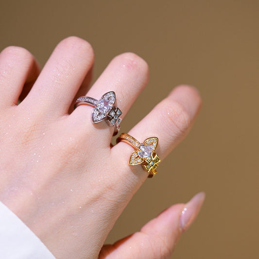 Anello lusso da donna regolabile a forma di Saturno con zirconi incastonati, in rame placcato oro e design geometrico minimalista