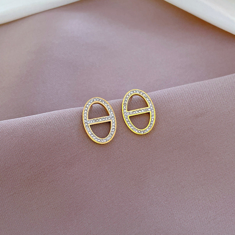 Pendientes de tuerca minimalistas geométricos de acero titanio con incrustaciones de diamantes de imitación para mujer, joyería de oreja de moda en tonos fríos para fiestas