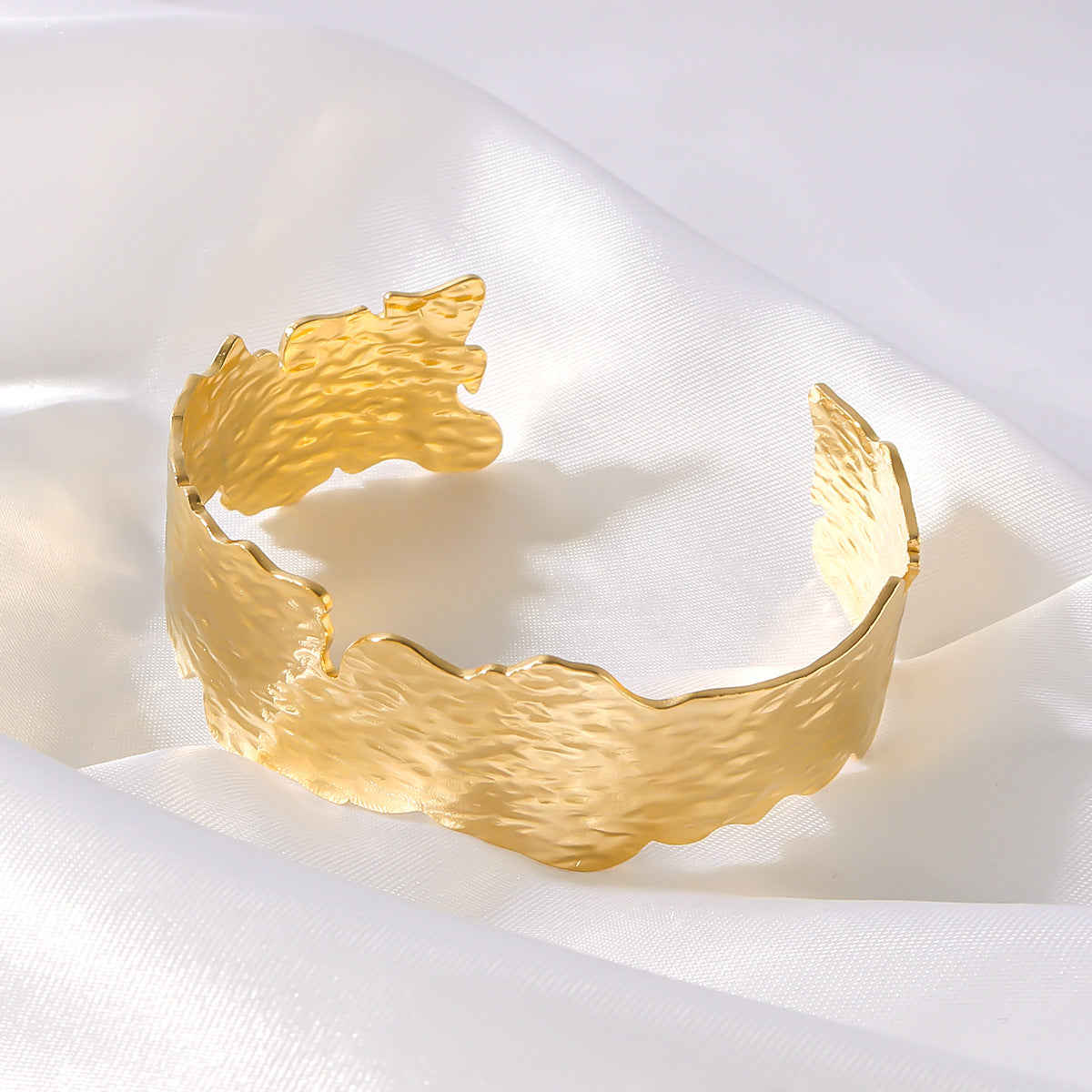 Vintage-Inspired Titanium Steel Bracelet with 18K Gold Plating, Irregular Open Design, Leaf Texture, and Geometric Shape