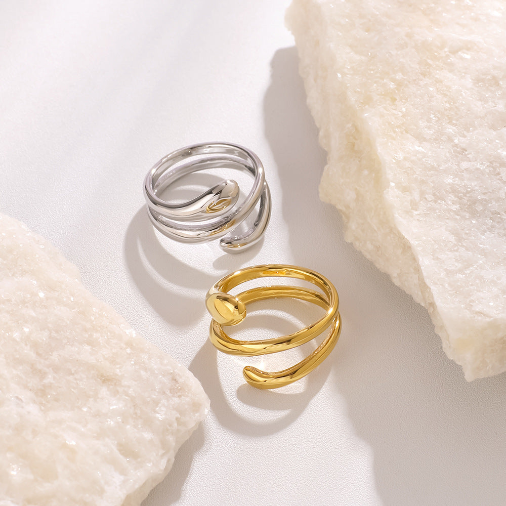 Anello multistrato minimalista in acciaio inossidabile lucidato da donna con forme geometriche e a goccia e placcatura sottovuoto in oro 18 carati