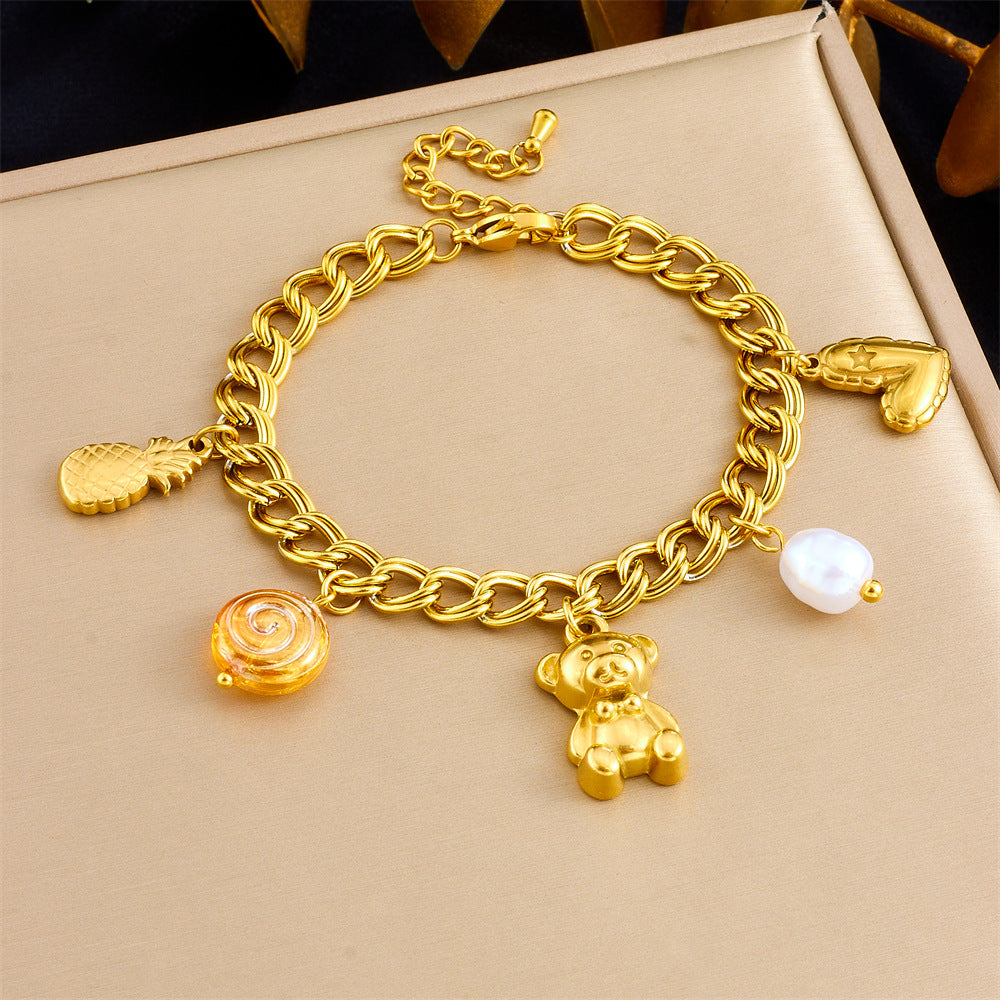 Elegante pulsera de acero inoxidable chapada en oro con doble círculo, colgante de corazón, piña u oso y detalles de perlas
