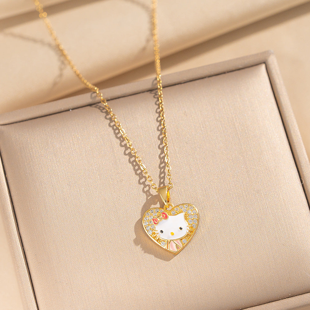 Collana con ciondolo dolce e carino a forma di gattino in acciaio al titanio placcato oro, con fiocco e design a fumetto, motivo a cuore, catena a O per donne