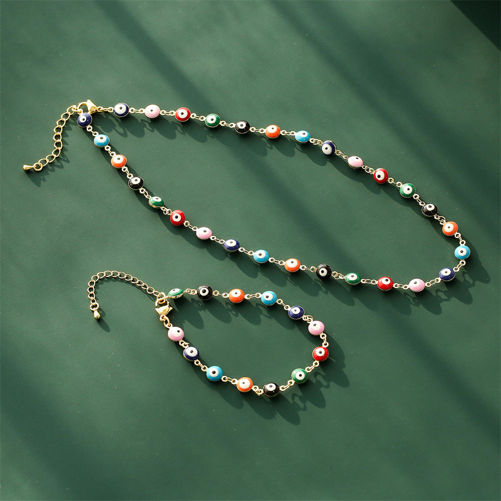 Collana pendente a occhio di Allah geometrico minimalista in rame placcato oro e finitura smaltata da donna