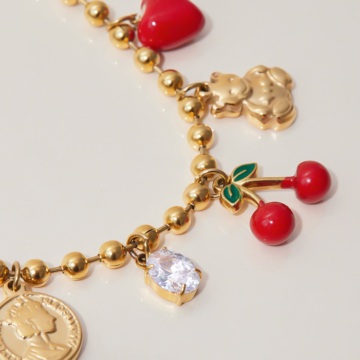 Collana minimalista in acciaio inossidabile a forma di ciliegia con intarsio di zirconi per donna, catena a clavicola multistrato in acciaio al titanio placcato