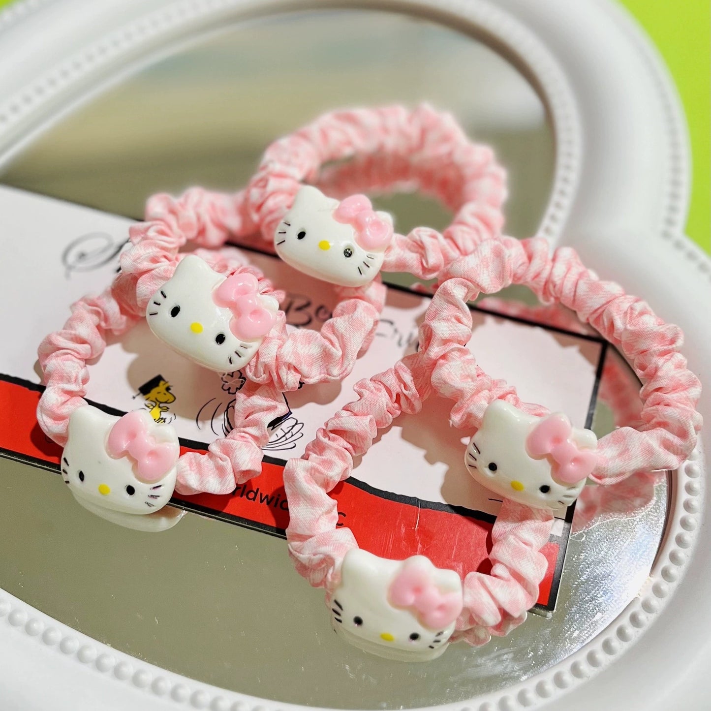 Set di elastici per capelli Hello Kitty carini con fiocco rosa e accenti color macaron per bambine, accessori per capelli in tessuto a maglia