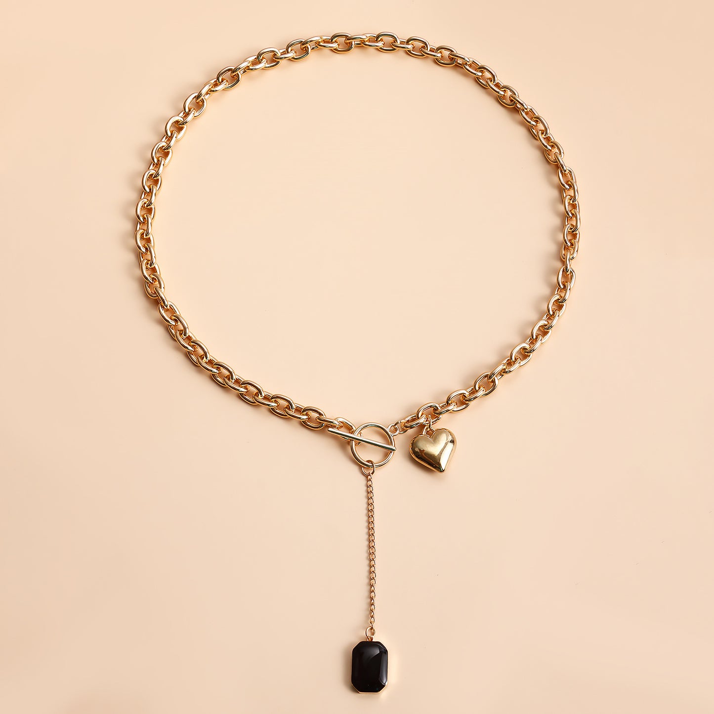 Minimalist Heart-Shaped Pendant Necklace with Electroplated Metal Chain and Tassel Detail for Women