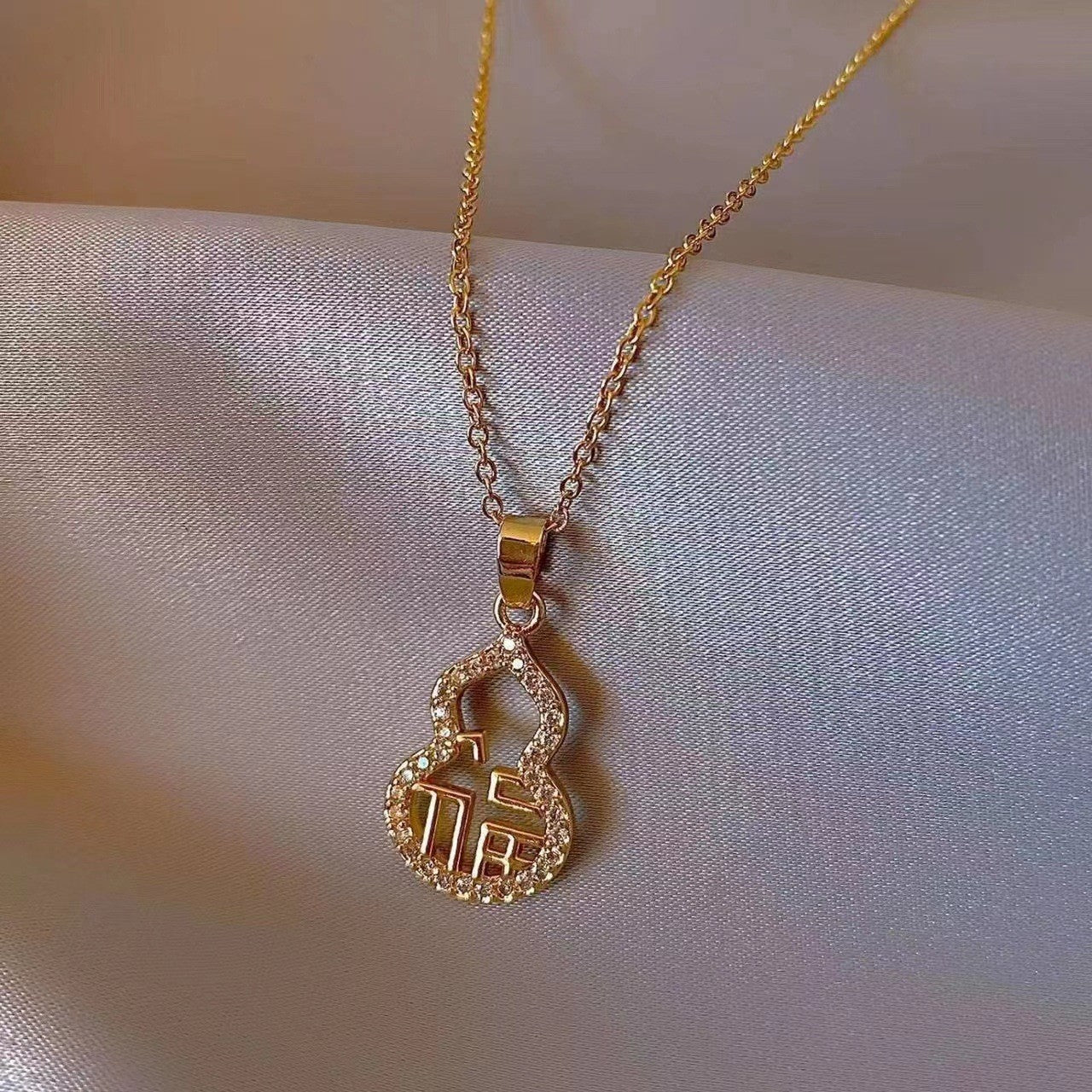 Minimalist Hollow Carved Calabash Pendant Necklace in Titanium Steel with Gold Plating for Men