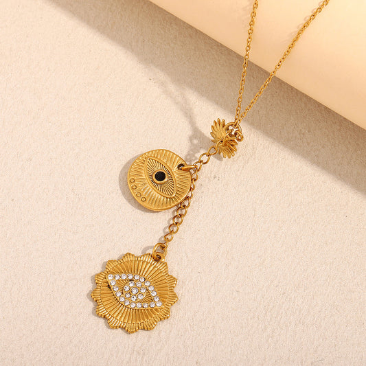 Collar con colgante geométrico minimalista de acero inoxidable con baño de oro de 18 quilates y detalle de borla de ojo para mujer