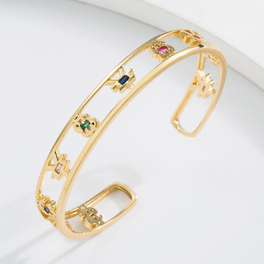 Pulsera de puño hueca geométrica minimalista para mujer con base de cobre bañada en oro de 18 quilates y circonitas micropavé