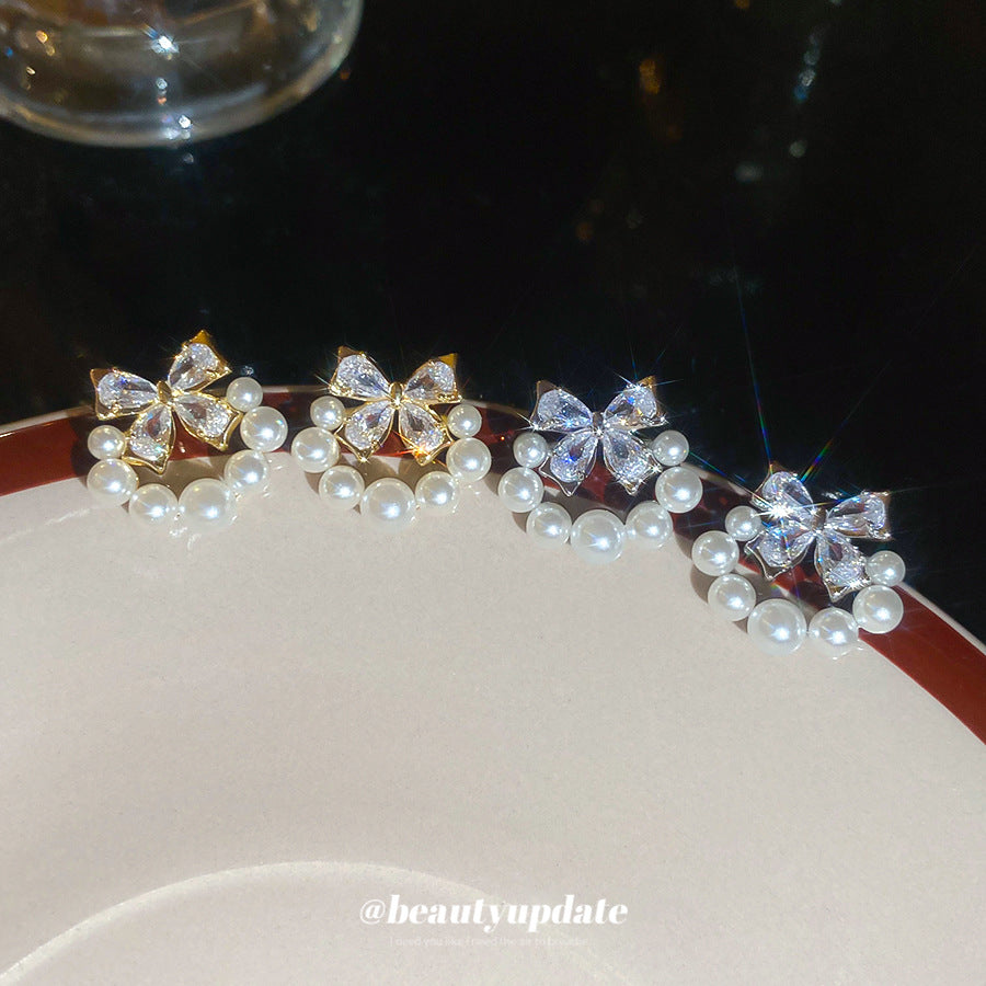 Elegantes pendientes de perlas simuladas en forma de lazo con incrustaciones de circonitas para mujer, joyería de moda minimalista de lujo para uso diario