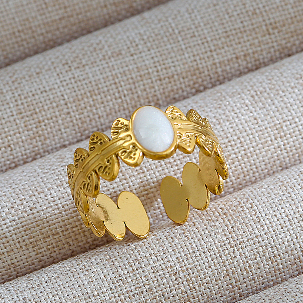 Anillo de acero de titanio con forma de U, estilo punk, chapado en oro de 18 quilates y detalles de microincrustaciones de piedra de lava ovalada