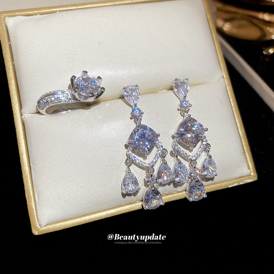 Pendientes elegantes de tuerca con diamantes de imitación y forma de lágrima, para mujer, con postes de acero inoxidable