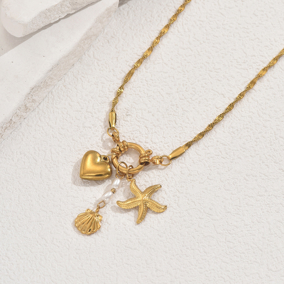 Collar con colgante minimalista de estrella y concha, inspirado en el océano, para mujer, con incrustaciones de perlas en cadena de cobre