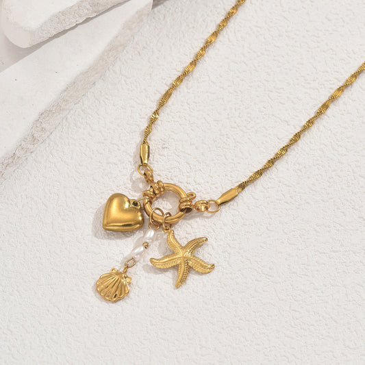 Collar con colgante minimalista de estrella y concha, inspirado en el océano, para mujer, con incrustaciones de perlas en cadena de cobre