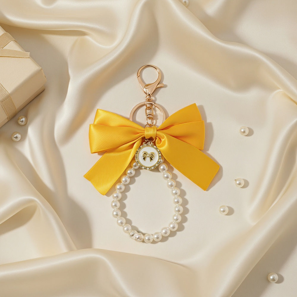 Sweet Cartoon Bow Pearl Zinc Alloy Keychain Bag Charm
