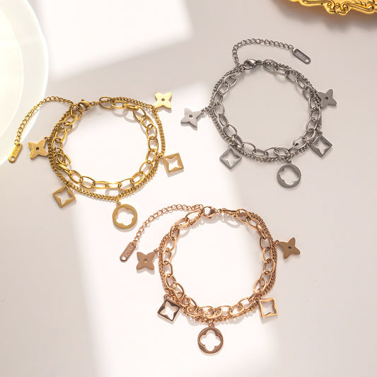 Pulsera minimalista con forma de trébol de acero de titanio para mujer con chapado en oro rosa de 18 quilates y diseño hueco