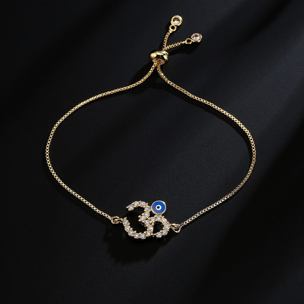 Bracciale da donna regolabile a catena in rame con placcatura in oro 18 carati e zirconi micro-pavé, design geometrico