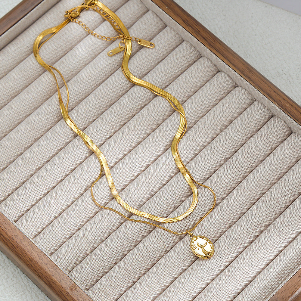 Collana a doppia catena serpente minimalista da donna in acciaio al titanio placcato oro 18K