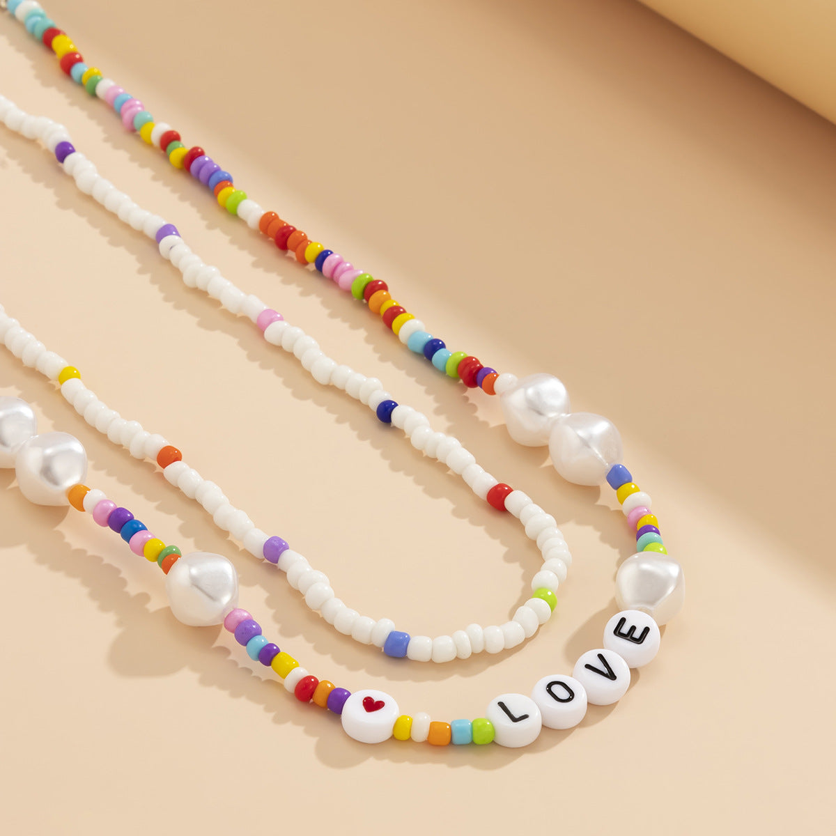Minimalist Geometric Resin Pearl Letter Necklace for Women with Braided Pendant and Round Bead Chain