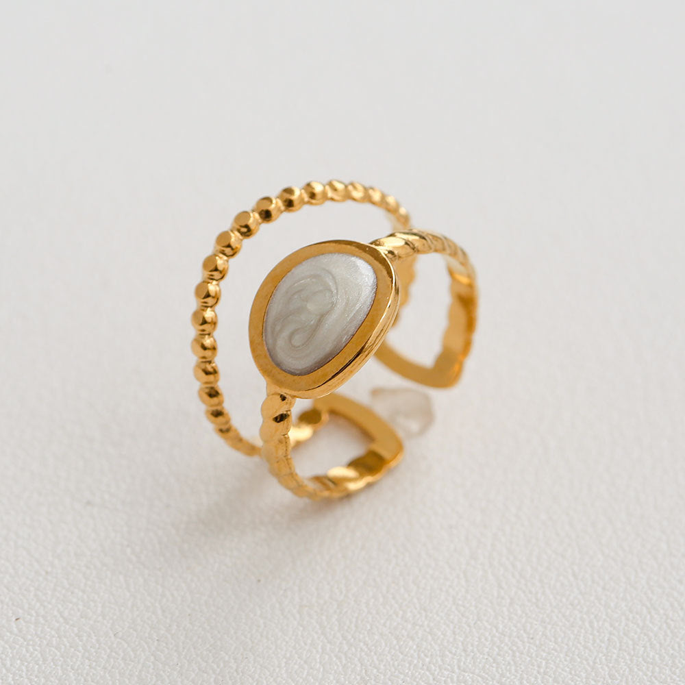 Anillo minimalista de acero de titanio con forma de girasol para mujer, con banda abierta ajustable y acabado chapado en oro