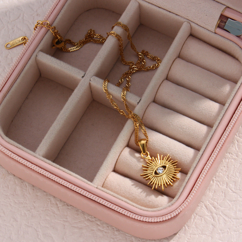 Collar con Colgante de Ojo Turco de Moda en Acero Inoxidable con Incrustaciones de Pedrería Radiante Hueca y Cadena Ondulada para Mujer