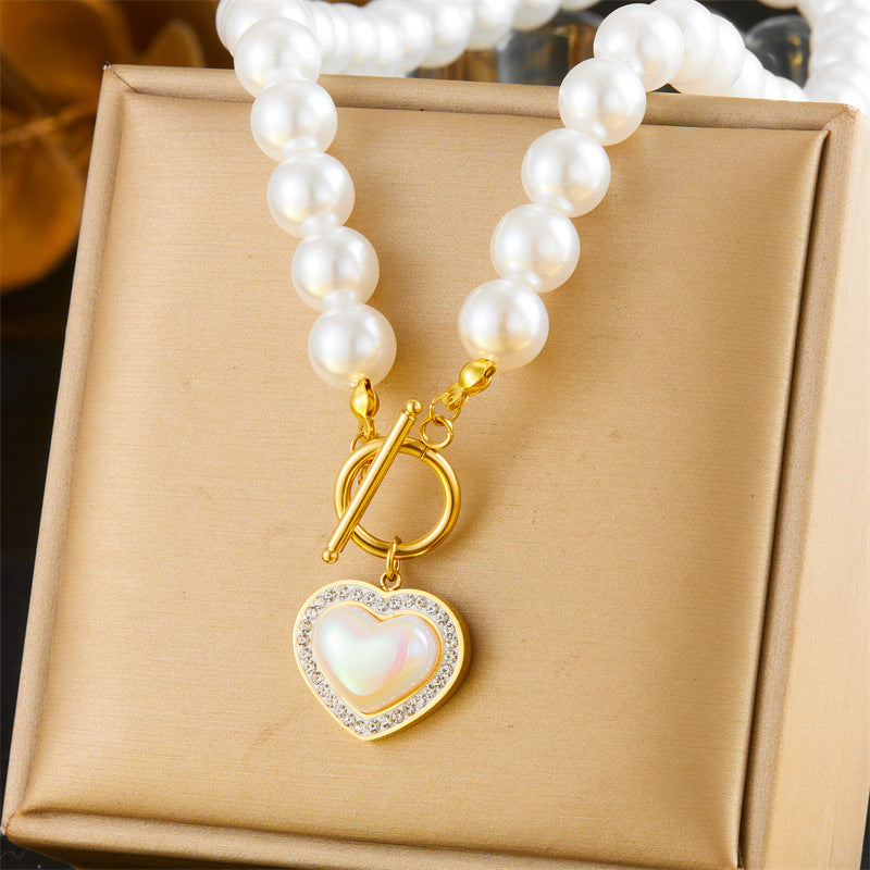 Conjunto de collar y pulsera de acero inoxidable chapado en oro con cadena de perlas vintage francés, broche OT, vieira y estrella de mar