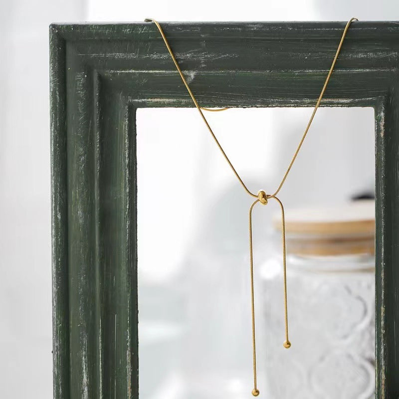 Collana regolabile con fiocco per uomo e donna in acciaio al titanio con finitura galvanizzata Design originale minimalista
