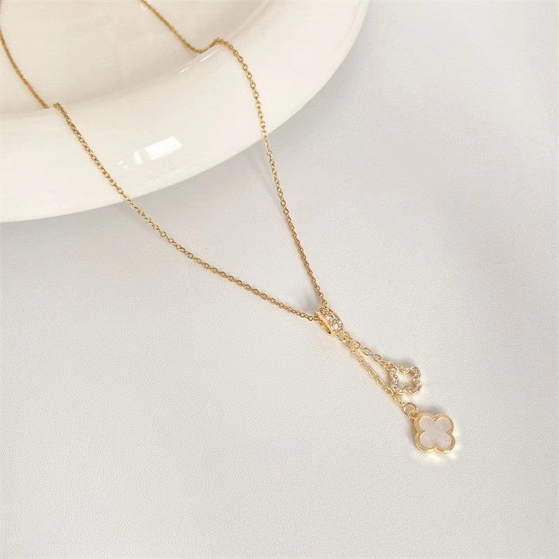 Collana con ciondolo minimalista a quadrifoglio in acciaio al titanio con finitura placcata su catena a O per donna e uomo