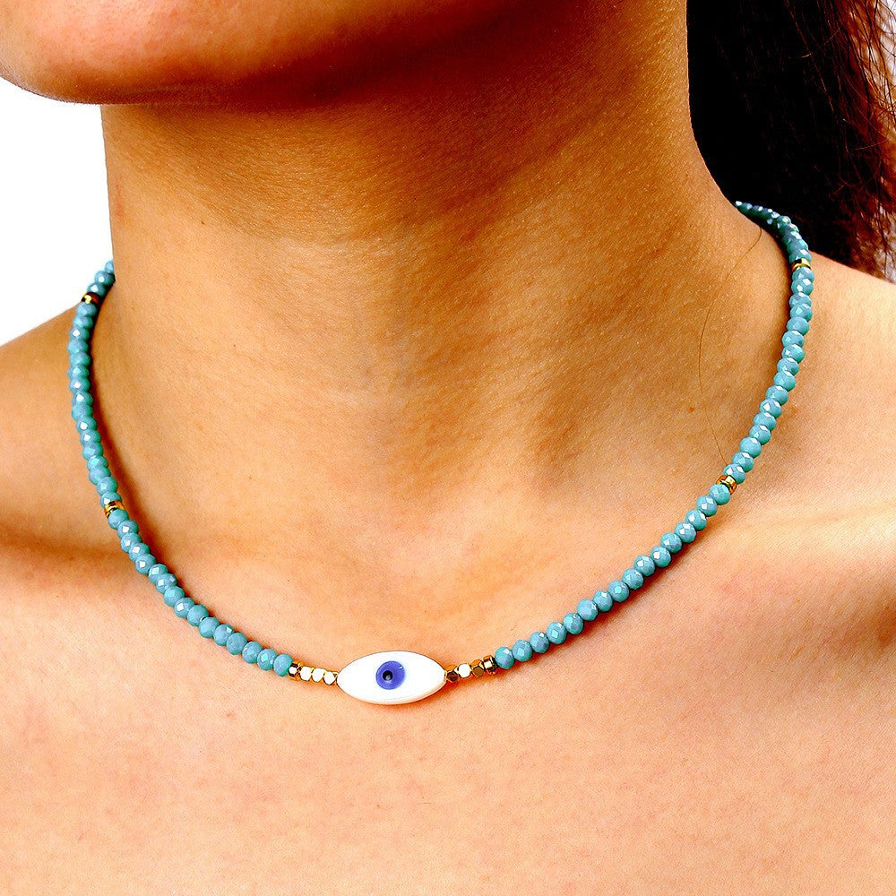 Collana con ciondolo a margherita minimalista con accenti di turchese e perle su catena a maglia per donna