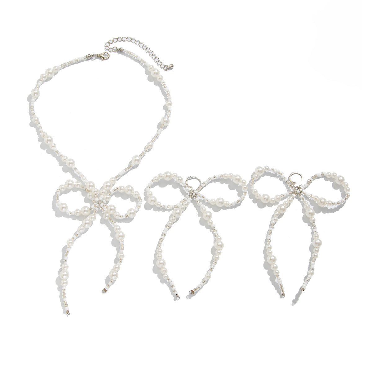 Elegante collana lunga con fiocco e nappa in stile minimalista con ciondolo di perla imitazione su catena a sfere da donna